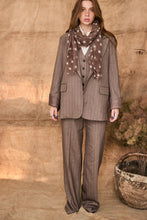 Pinstripe beige suit