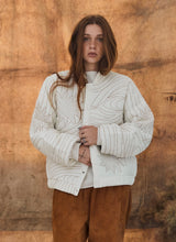 Quilted jacket with design stitching