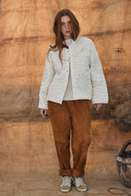 Quilted jacket with design stitching