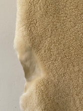 Fluffy offwhite sheep skin