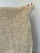 Fluffy offwhite sheep skin