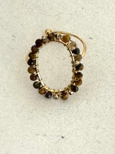 Gold oval stone rings