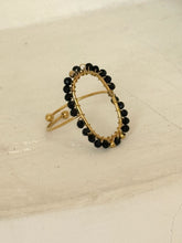 Gold oval stone rings