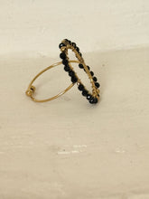 Gold oval stone rings