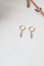 Dangly hoop three stone earrings grey