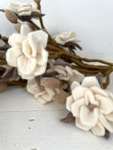 magnolia branch with off white flower