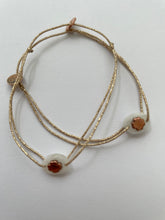 Oval rock treffle bracelet on lurex string