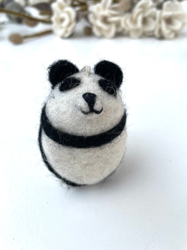 little cream black panda