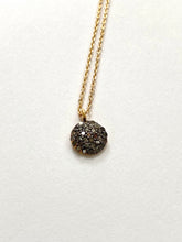 grey zirconium necklace on gold plated chain