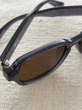 brown and dark grey  sunglasses