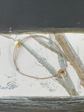 Large moon bracelet on lurex string