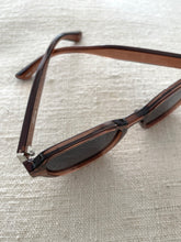 brown and dark grey  sunglasses