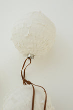 white paper hanging ball ornament