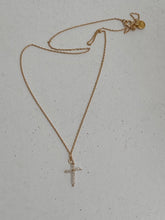 stone cross on gold plated chain