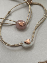 Oval rock heart bracelet on lurex string