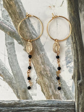 Thin hoop with medallion, chain and beads