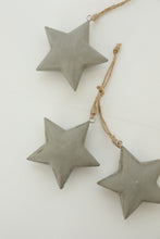grey hanging star with earthy thread