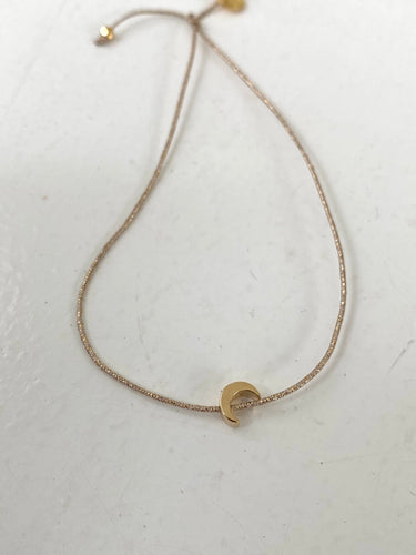 Moon  bracelet on lurex string
