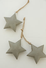 grey hanging star with earthy thread