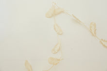 holiday paper feather garland