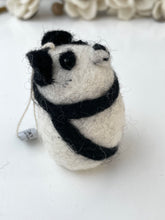 little cream black panda