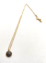 grey zirconium necklace on gold plated chain